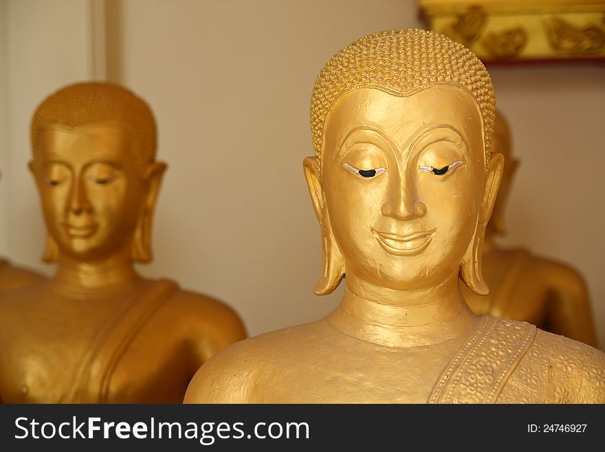 The golden face of buddha in the temple