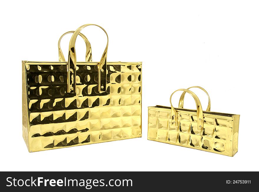 Two brass decorative bags on white background. Two brass decorative bags on white background