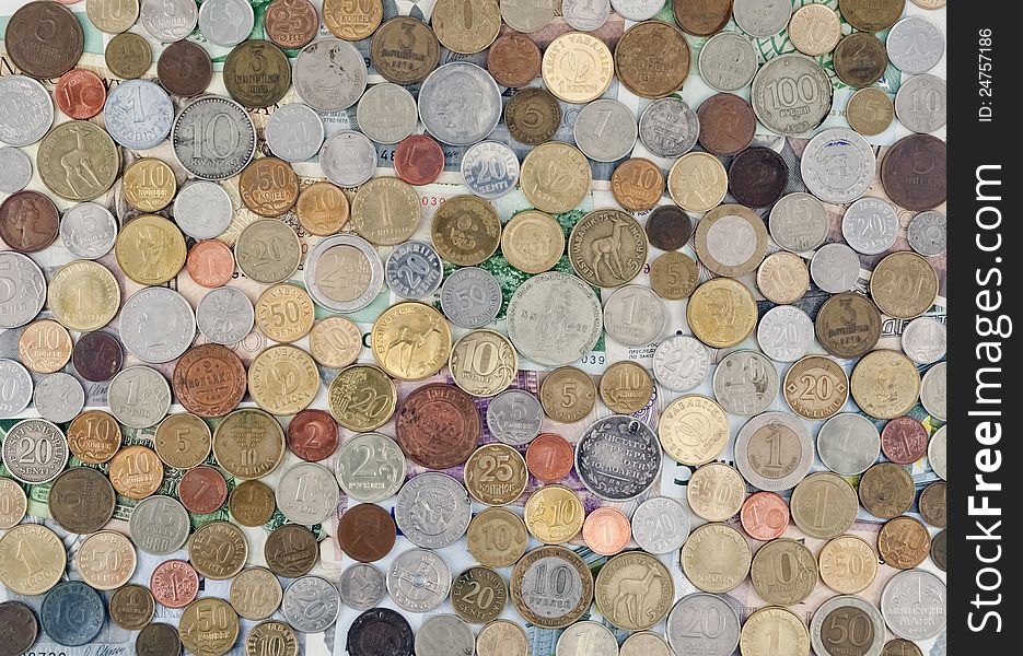The background of the different coins and notes, texture