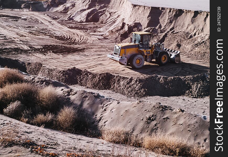 Tractor Loader In An Opencast Sand Mine.