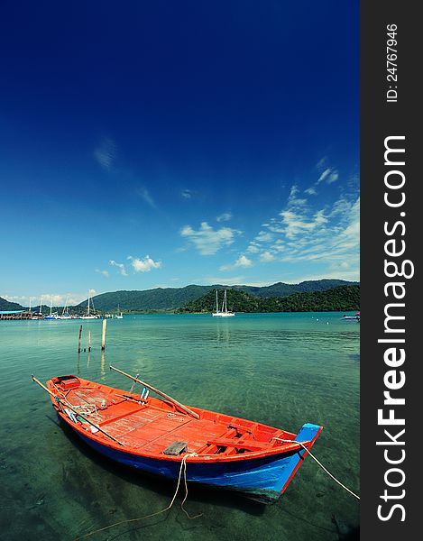 Place: The fishing village.In Koh Chang Trat Thailand Life of a fisherman in lazy day in Koh Chang Beautiful sky and blue sea. Place: The fishing village.In Koh Chang Trat Thailand Life of a fisherman in lazy day in Koh Chang Beautiful sky and blue sea