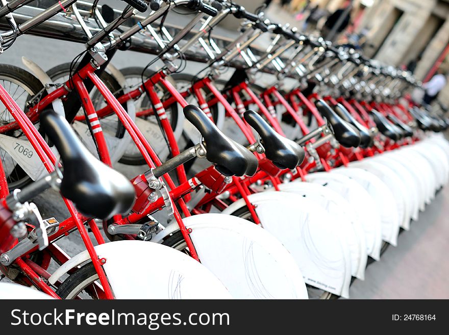 Bikes for rent in the street in Barcelona - Spain. Bikes for rent in the street in Barcelona - Spain