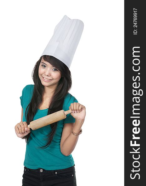 Beautiful asian young chef isolated over white background