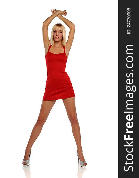 Young Blond Woman wearing a red dress on a white background