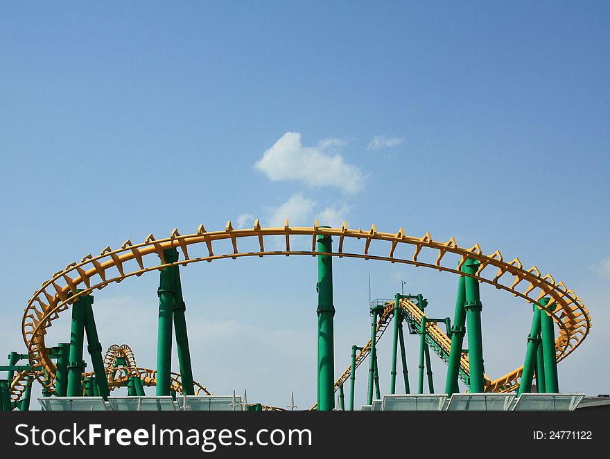 This is a roller coaster photo in a park.