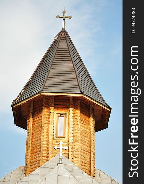 Photo of an church tower in the blue sky