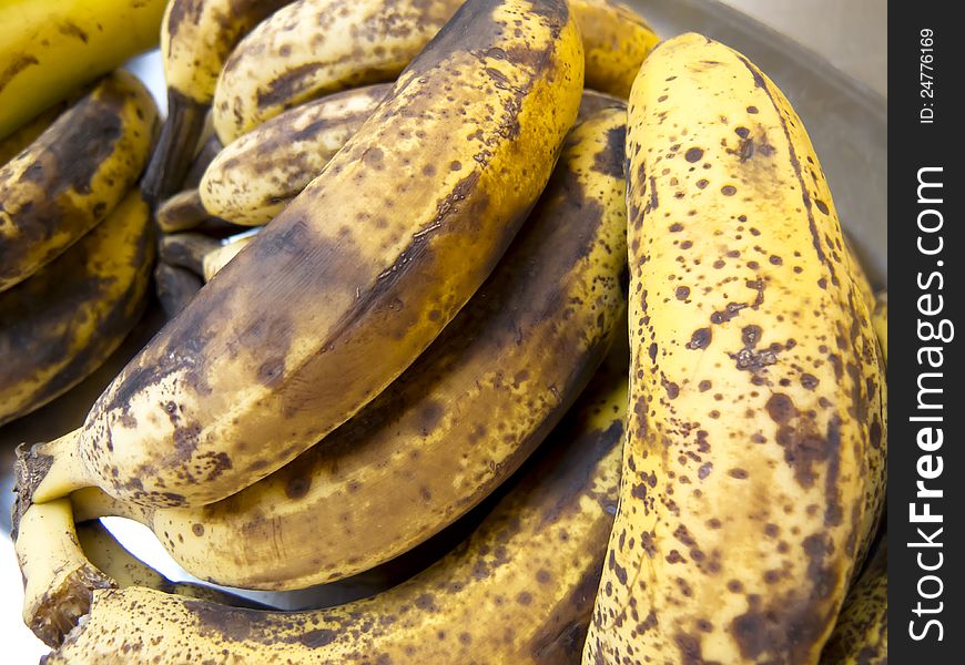 Too many ripe bananas about to be thrown. Too many ripe bananas about to be thrown