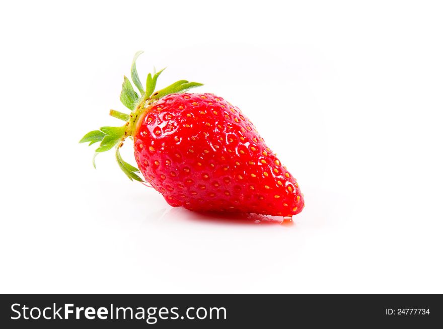 Single strawberry isolated on white