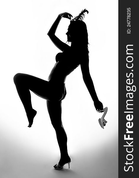 Silhouette of beautiful dancer in crazy pose. Silhouette of beautiful dancer in crazy pose.