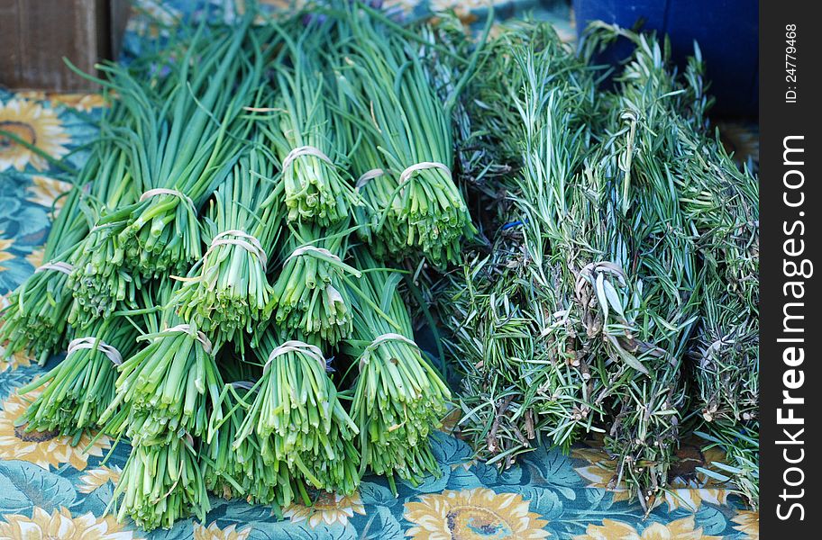 Herbs: Chives and Rosemary at Farmer's Market. Herbs: Chives and Rosemary at Farmer's Market