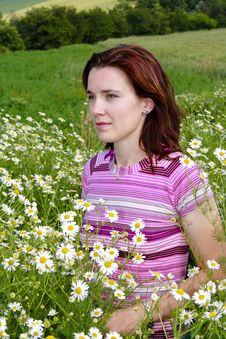 Woman In Chamomile Stock Image