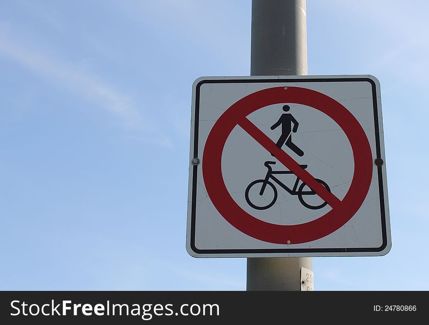 Warning sign that no pedestrians nor bicycles are allowed on that road. Warning sign that no pedestrians nor bicycles are allowed on that road