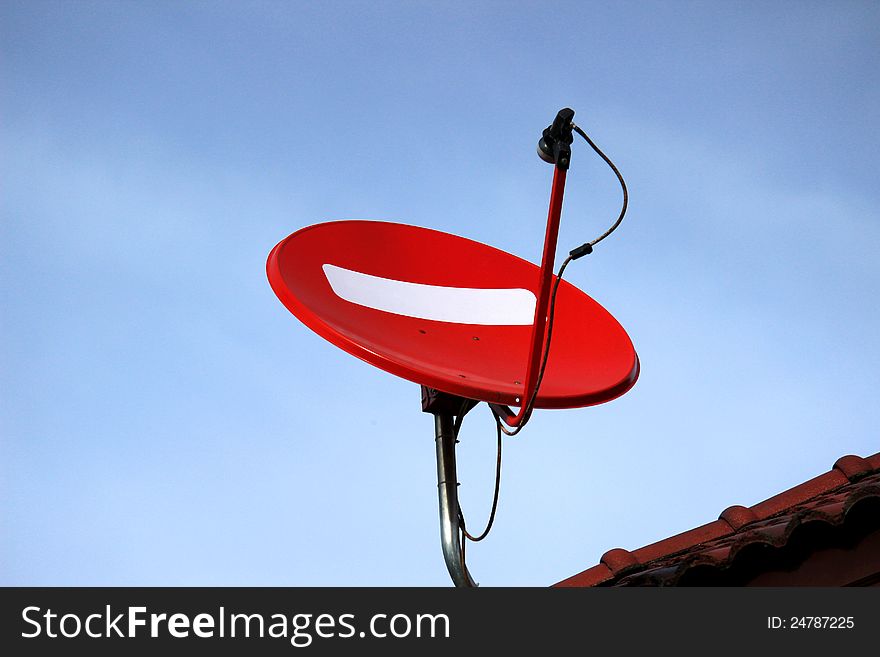 Red Satellite dish on the roof