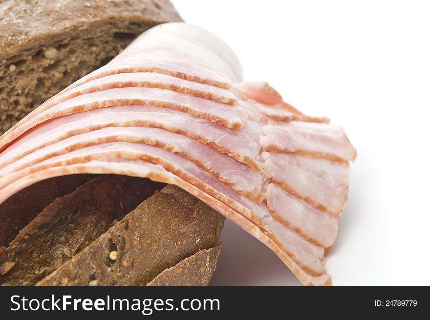 Raw bacon with bread