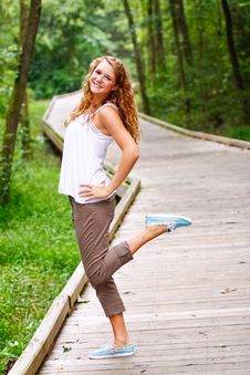Fun-loving Teenage Girl Walking In A Park Stock Photo Fun-loving Teenage Girl Walking In A Park Stock Photo
