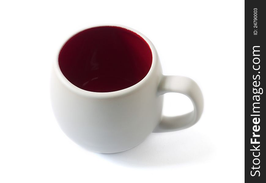 A white cup with red interior isolated on the white background