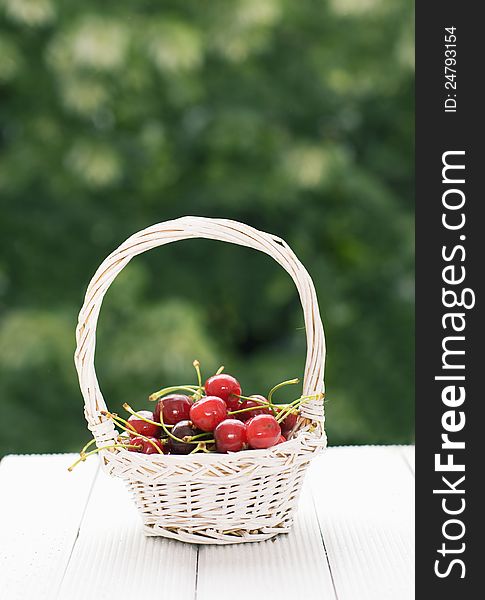 Cherries on a wooden white table