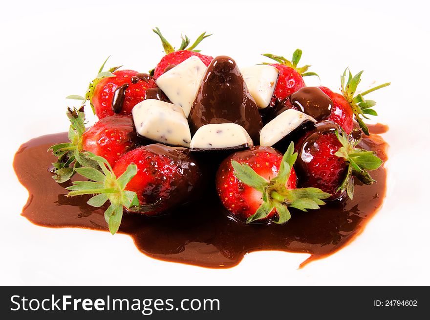 Strawberries in chocolate isolated on white. Strawberries in chocolate isolated on white