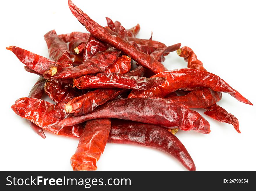Dry red chili pepper on white background
