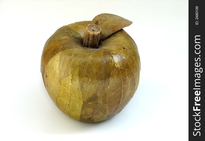 Decorative apple made of dried leafs and wood, handmade. Decorative apple made of dried leafs and wood, handmade