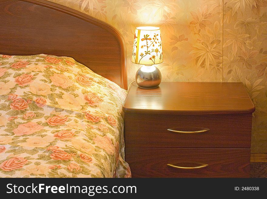 Bed and lamp