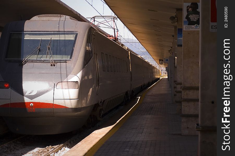 Train and platform at Italian trainstation. Train and platform at Italian trainstation