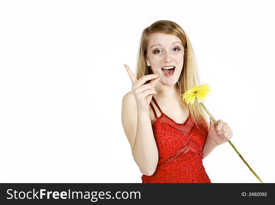 Attractive blond picking petals from a daisy. Attractive blond picking petals from a daisy