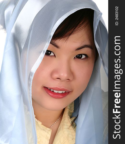 Pretty asian girl smiling looking to camera with hood. Pretty asian girl smiling looking to camera with hood