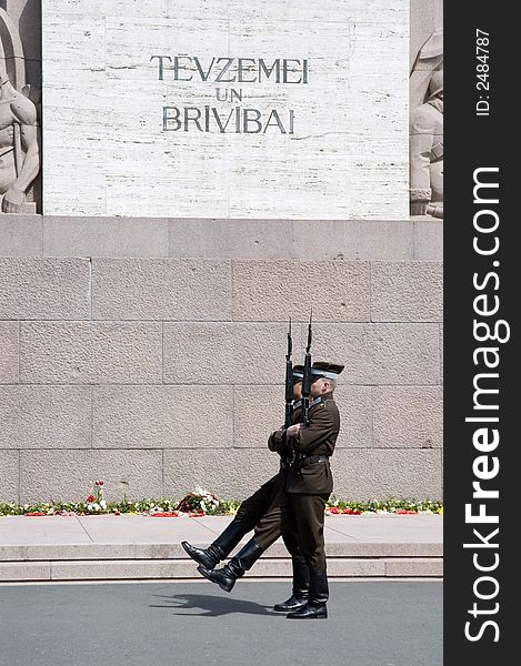 Guard of honour at a monument to Freedom in Riga