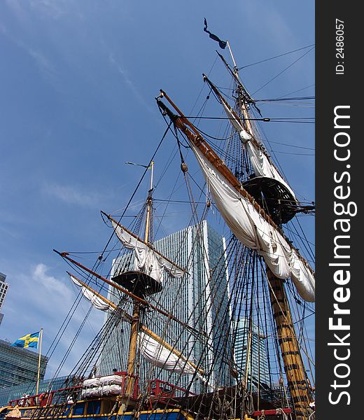 Old Swedish Sailing Ship docked in London's Canary Wharf business district. Old Swedish Sailing Ship docked in London's Canary Wharf business district