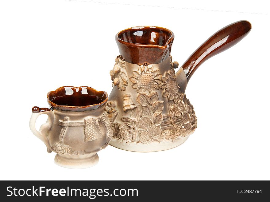 Ornated coffee making pot with cup. Ornated coffee making pot with cup