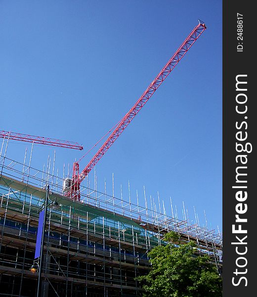 A Image of a crane in a building site in Romford. A Image of a crane in a building site in Romford.
