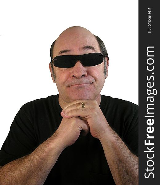 A bald headed man with sunglasses on, appearing as if he's listening,over white. A bald headed man with sunglasses on, appearing as if he's listening,over white