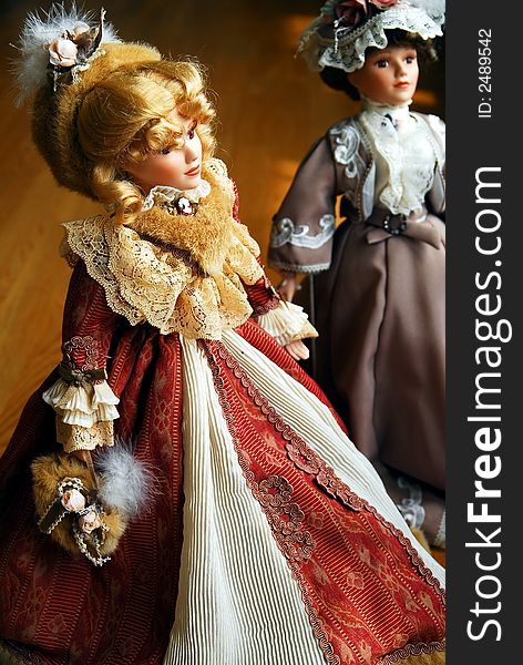 Two elegant lady porcelain dolls. Two elegant lady porcelain dolls