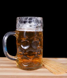 Glass Of Fresh Beer With Foam And Chips Royalty Free Stock Photography