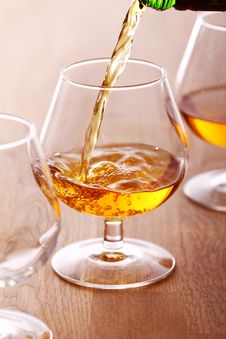 Pouring Cognac Into The Glass Stock Image Pouring Cognac Into The Glass Stock Image