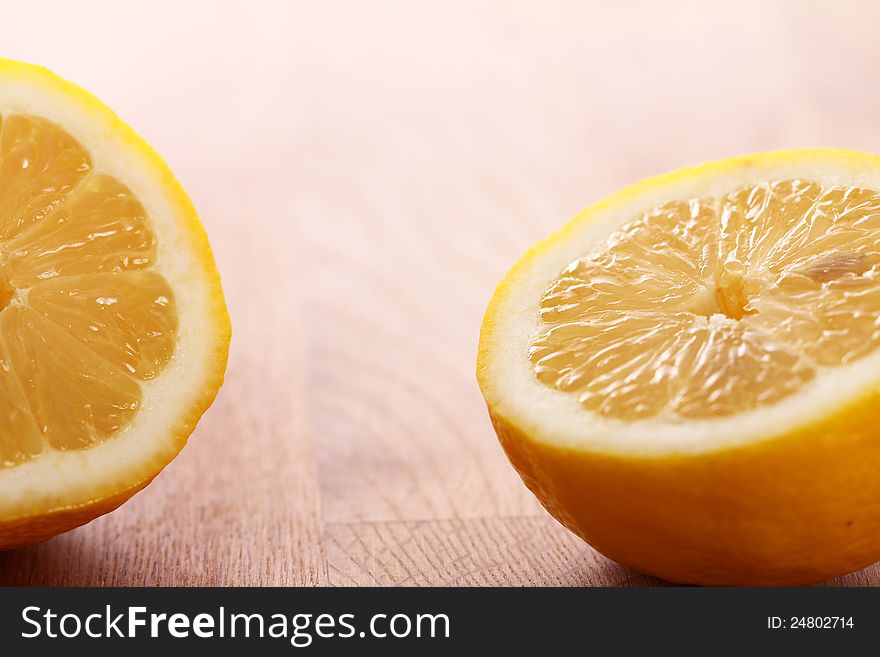 Close up of fresh lemons on wooden board