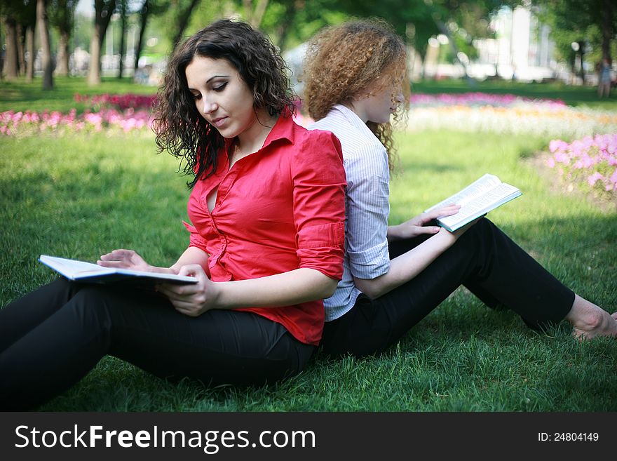 Two friends learn lessons outdoors summer