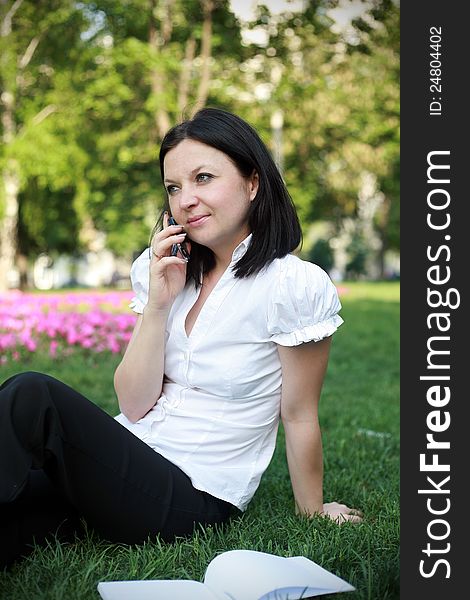 Girl talking on the phone outdoors