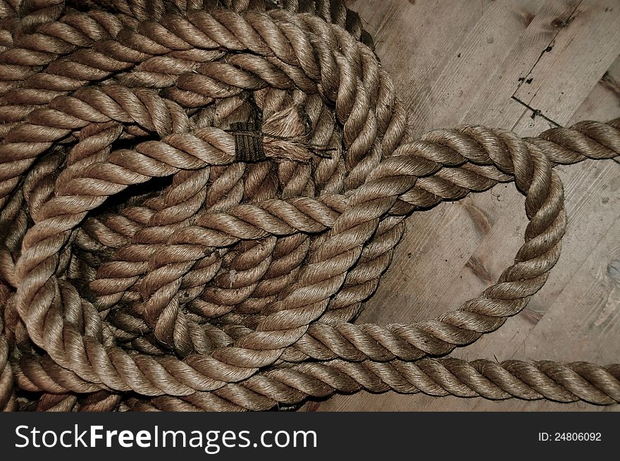 Nautical rope on the boat wooden floor