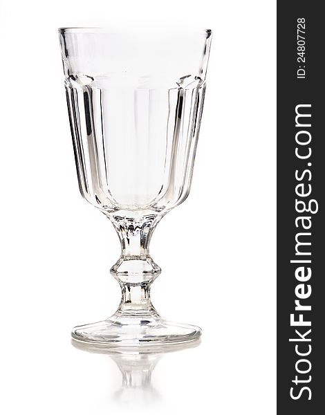 Empty Glass with reflection on a white background. Empty Glass with reflection on a white background.