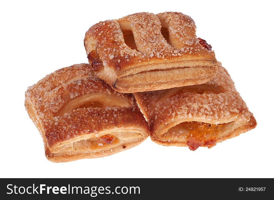 Three buns with jam isolated on white