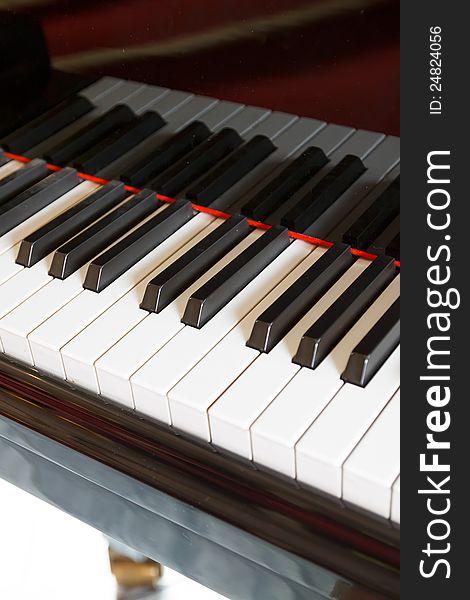Grand piano with ebony and ivory keys