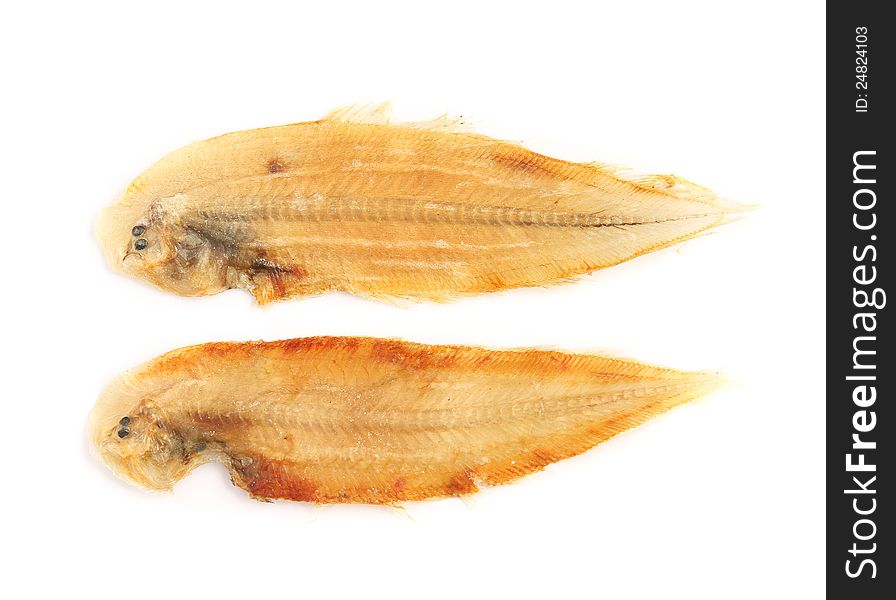 Two dried fish on white background