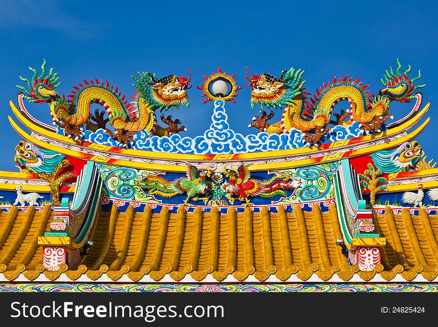 Chinese style dragon statue on blue sky