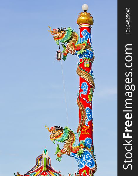 Chinese style dragon statue on blue sky