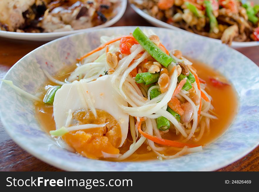 Papaya salad on table at restaurant