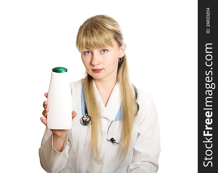 Woman doctor holds a bottle in his hand with cosmetic