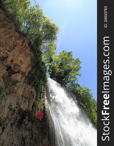 Natural waterfall in green forest