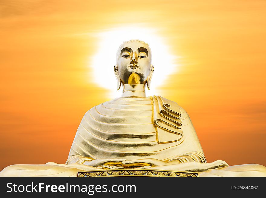 Big buddha statue with sunset. Temple of Thailand